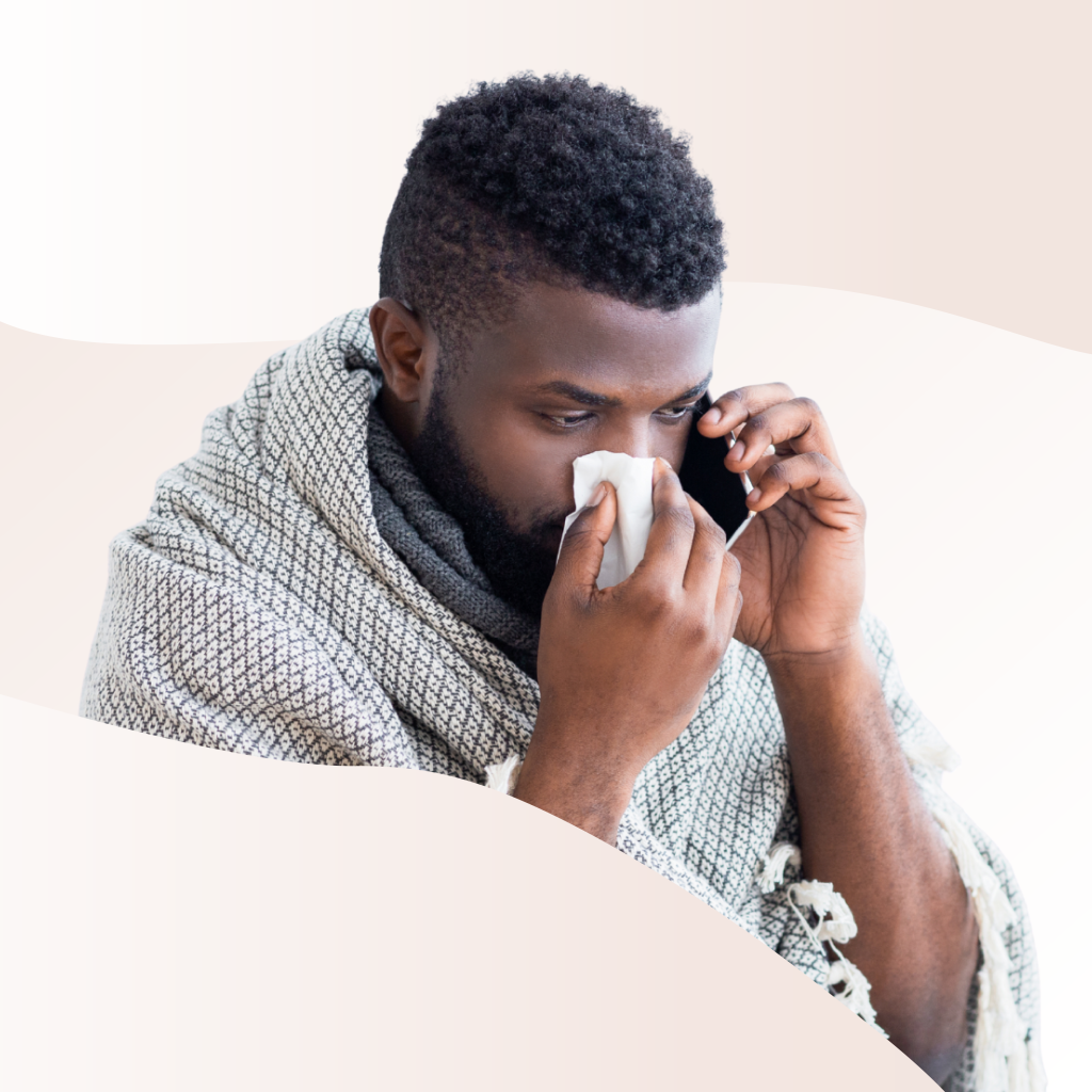 Someone blowing their nose into a tissue while on the phone.