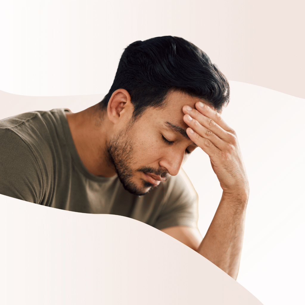 Someone with their hand resting on their forehead. They appeared to be stressed.