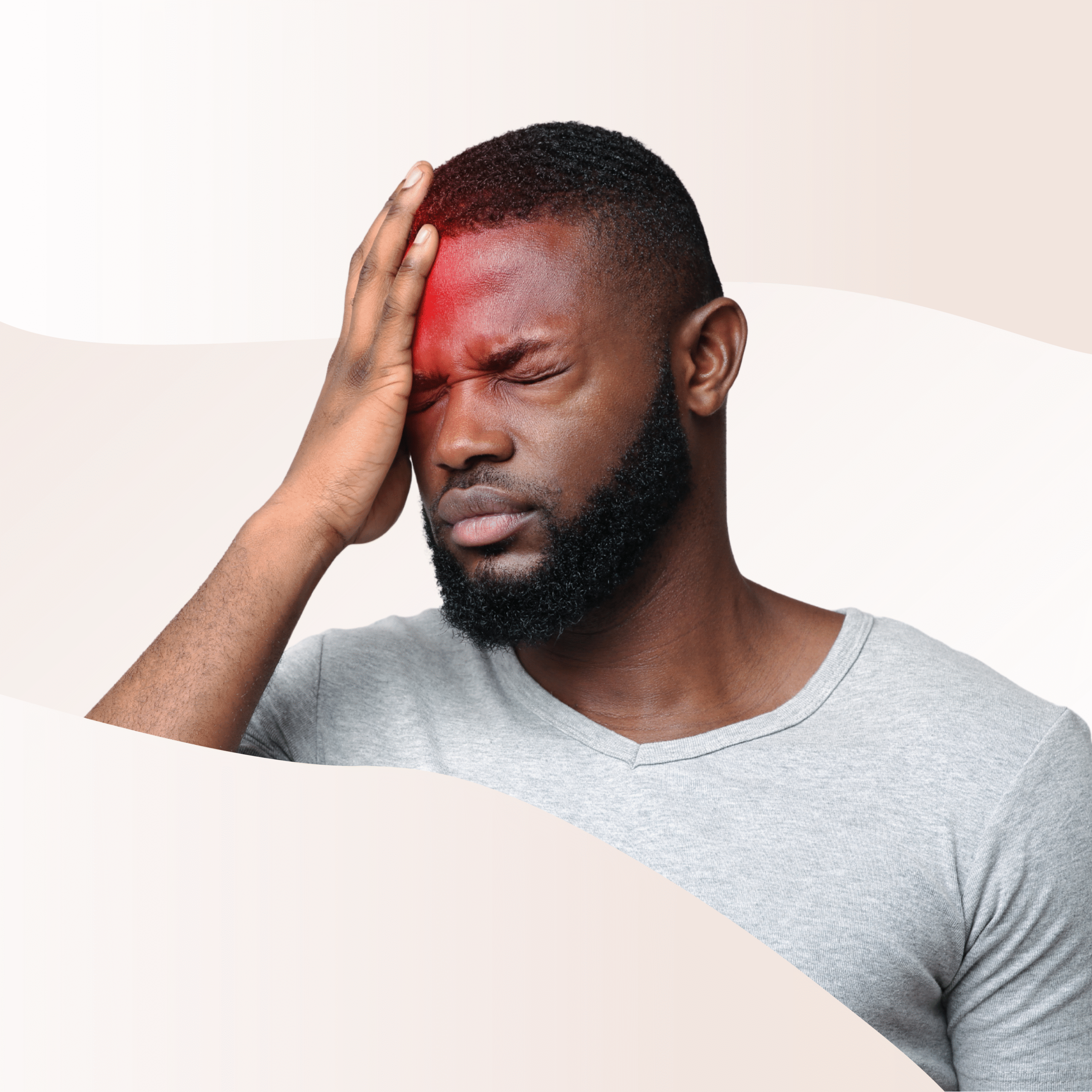 Someone with their hand resting on their forehead. They appear to be in pain