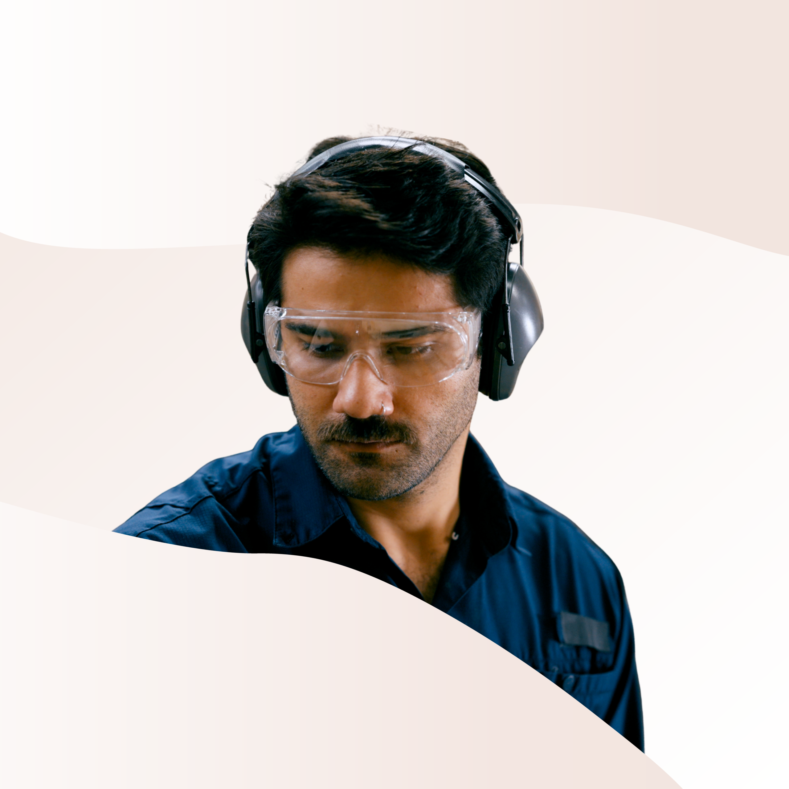 Someone wearing safety glasses